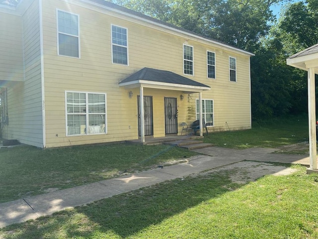 view of front of home with a front lawn