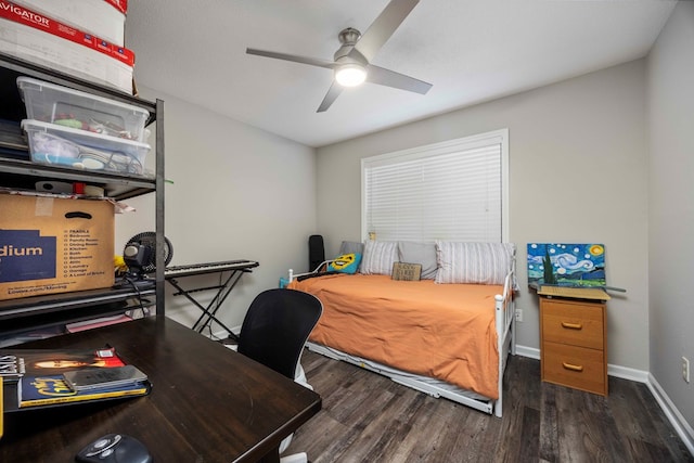 bedroom featuring ceiling fan and dark hardwood / wood-style floors