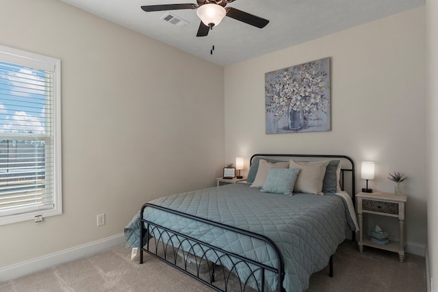 bedroom with carpet, visible vents, ceiling fan, and baseboards