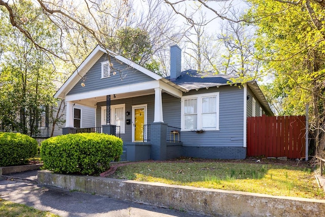 1024 18th St, Columbus, GA 31901 - view of front of property with covered porch and a chimney
