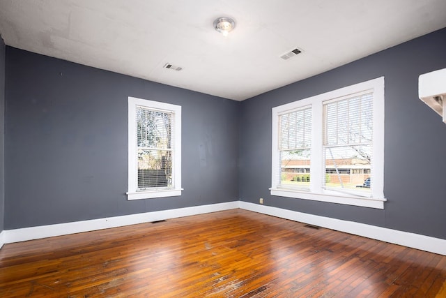 1024 18th St, Columbus, GA 31901 - empty room featuring hardwood / wood-style flooring and plenty of natural light