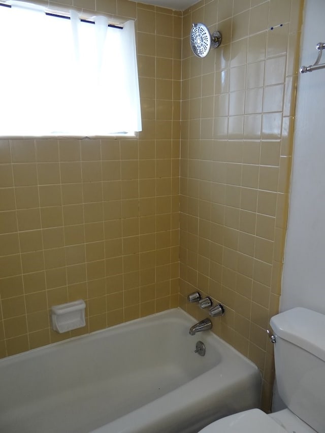 full bathroom featuring shower / bathing tub combination and toilet