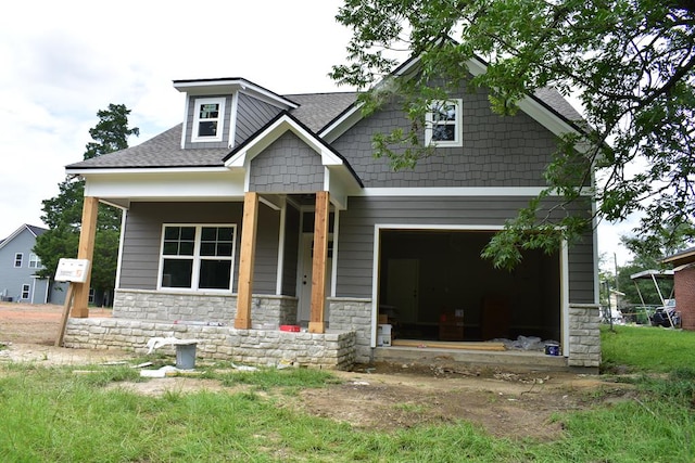 5404 Moon Rd, Columbus, GA 31909 - craftsman inspired home featuring a garage, stone siding, a shingled roof, and a porch