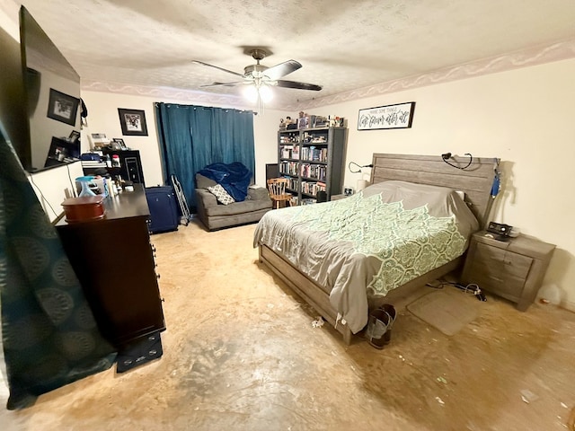 bedroom with a textured ceiling and ceiling fan
