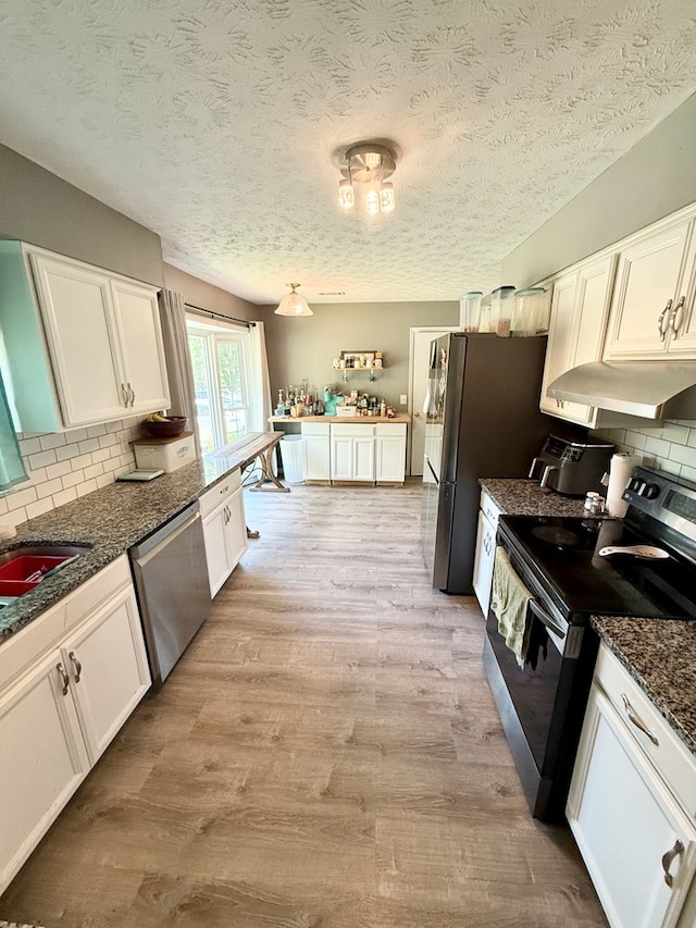 kitchen with white cabinetry, black / electric stove, under cabinet range hood, and dishwasher