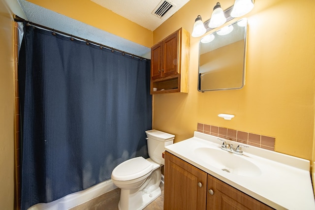 1043 Quincy Dr, Columbus, GA 31906 - full bathroom with vanity, shower / tub combo with curtain, tile patterned floors, and backsplash