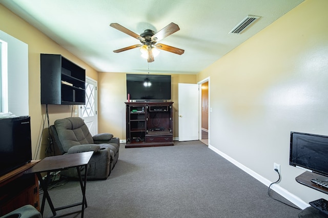 1043 Quincy Dr, Columbus, GA 31906 - living room with a ceiling fan and carpet floors
