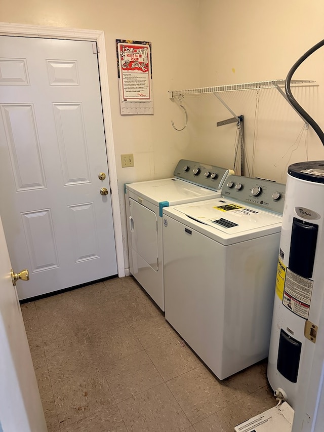 1103 52nd St, Columbus, GA 31904 - laundry area with electric water heater and independent washer and dryer
