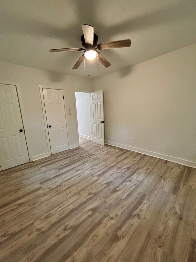 4026 Bowman St, Columbus, GA 31903 - unfurnished bedroom with wood finished floors and a ceiling fan