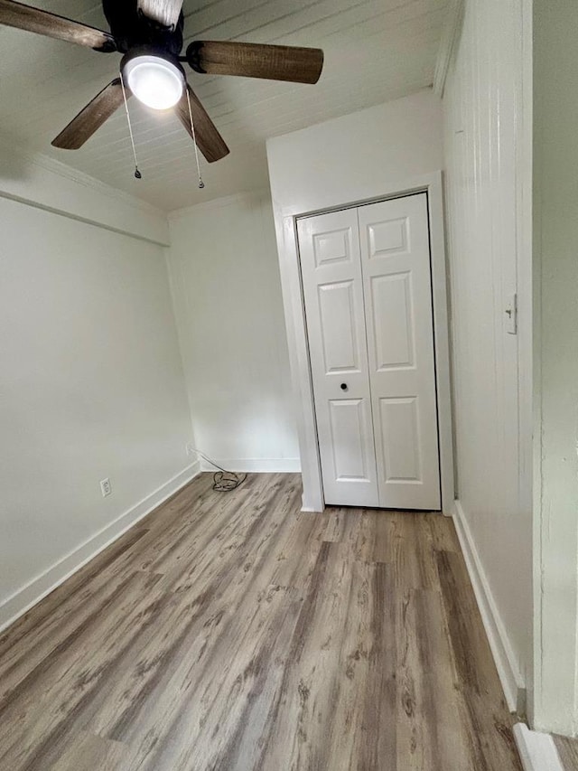 4026 Bowman St, Columbus, GA 31903 - unfurnished bedroom with wood finished floors, a closet, and a ceiling fan