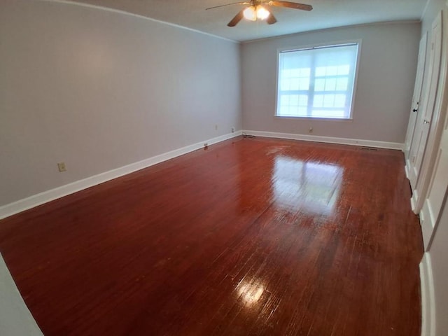 952 N Ave, Macon, GA 31211 - spare room with ceiling fan, dark wood-style floors, baseboards, and ornamental molding