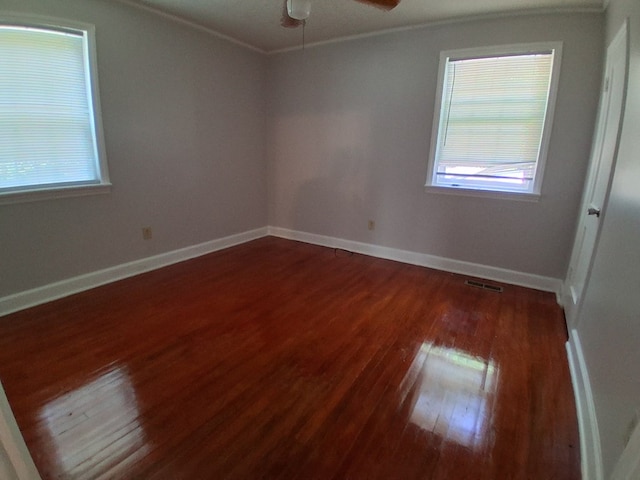952 N Ave, Macon, GA 31211 - spare room with wood finished floors, ornamental molding, ceiling fan, and baseboards