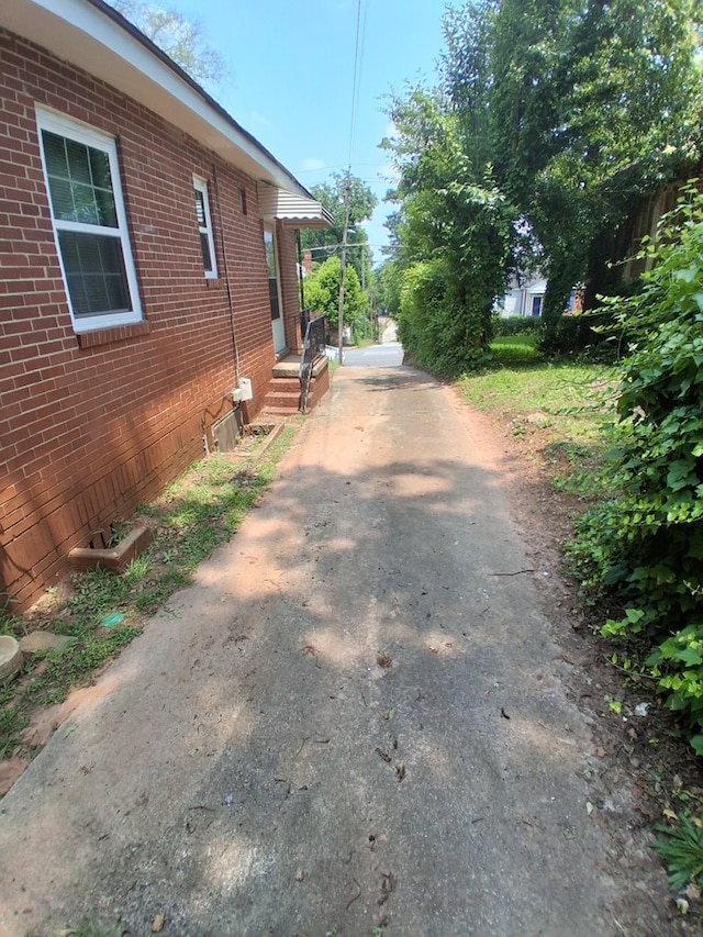 952 N Ave, Macon, GA 31211 - view of home's exterior featuring brick siding