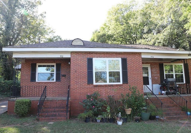 952 N Ave, Macon, GA 31211 - bungalow featuring a porch and brick siding