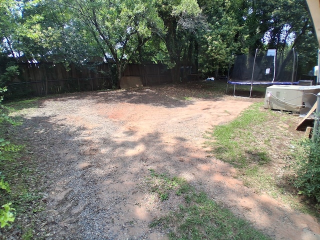 952 N Ave, Macon, GA 31211 - view of yard featuring a trampoline and a cooling unit