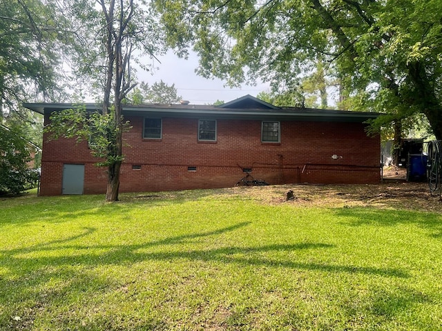 4268 Yates Dr, Columbus, GA 31907 - back of house with crawl space, a yard, and brick siding