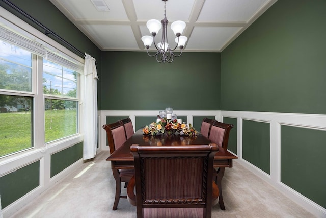 1417 Cloverdale Rd, Columbus, GA 31904 - carpeted dining area with a chandelier, coffered ceiling, and a wainscoted wall