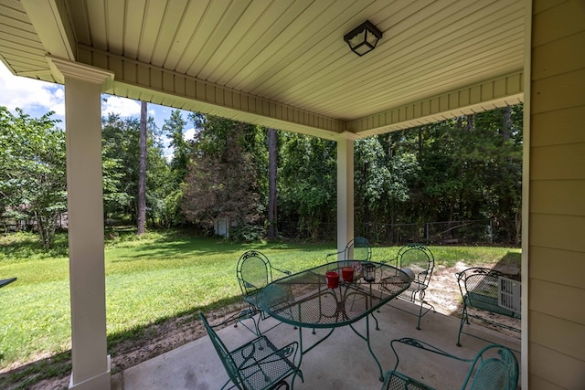 1417 Cloverdale Rd, Columbus, GA 31904 - view of patio with outdoor dining space and view of scattered trees