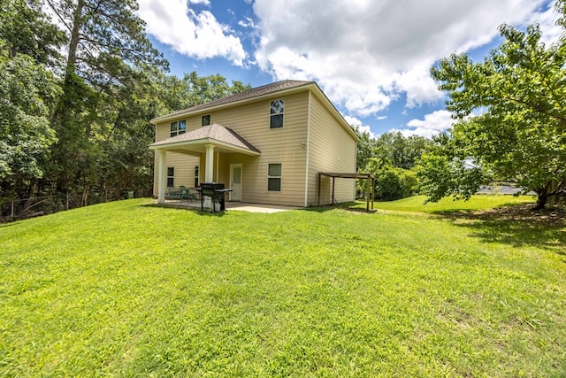 1417 Cloverdale Rd, Columbus, GA 31904 - back of property featuring a patio area and a lawn