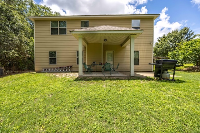 1417 Cloverdale Rd, Columbus, GA 31904 - rear view of property featuring a patio area and a yard