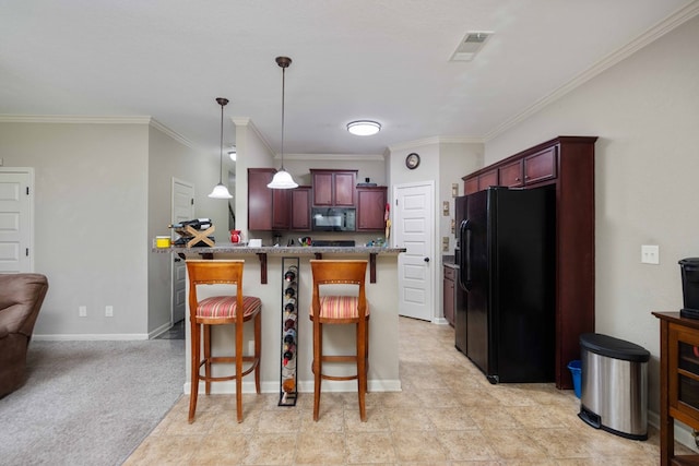 1417 Cloverdale Rd, Columbus, GA 31904 - kitchen with black appliances, reddish brown cabinets, a kitchen breakfast bar, ornamental molding, and a peninsula