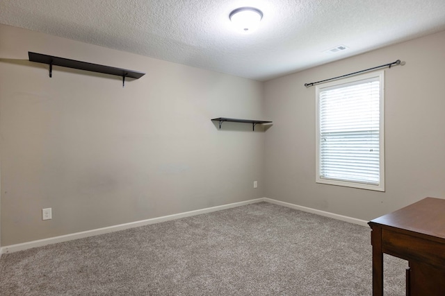 1417 Cloverdale Rd, Columbus, GA 31904 - empty room featuring a textured ceiling and carpet