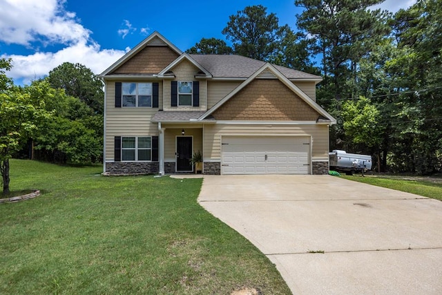 1417 Cloverdale Rd, Columbus, GA 31904 - craftsman house featuring stone siding, driveway, a front lawn, and a garage