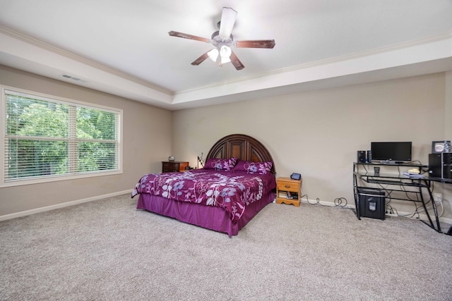 1417 Cloverdale Rd, Columbus, GA 31904 - carpeted bedroom with ornamental molding, a tray ceiling, and ceiling fan