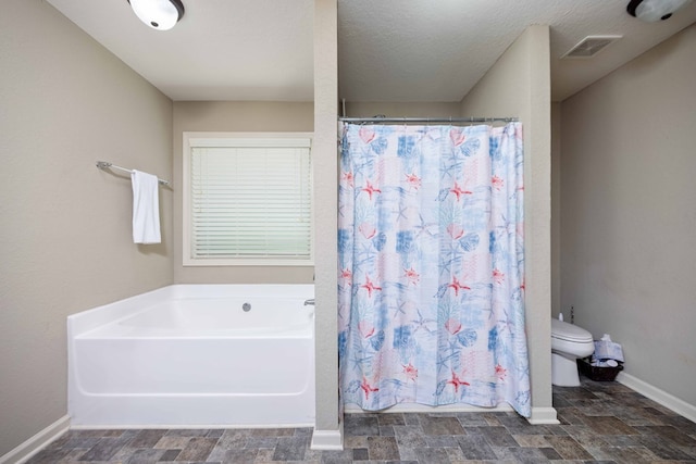 1417 Cloverdale Rd, Columbus, GA 31904 - bathroom with a garden tub and curtained shower