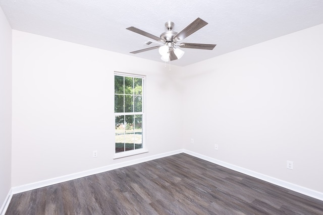 924 Vista Dr, Columbus, GA 31907 - unfurnished room with dark wood finished floors, baseboards, and ceiling fan