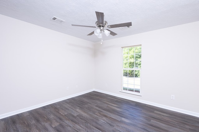 924 Vista Dr, Columbus, GA 31907 - spare room featuring baseboards, visible vents, ceiling fan, and dark wood finished floors