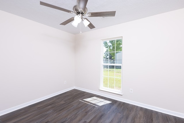 924 Vista Dr, Columbus, GA 31907 - empty room featuring ceiling fan, baseboards, a textured ceiling, and dark wood-style floors
