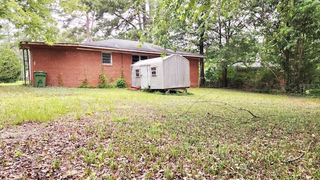 1434 John Smith Ave, Columbus, GA 31903 - view of green lawn featuring a storage unit