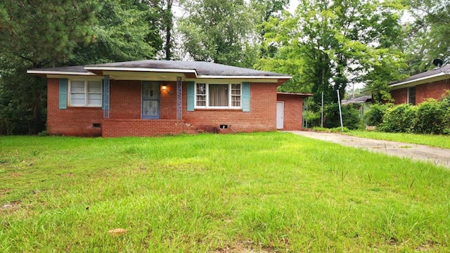 1434 John Smith Ave, Columbus, GA 31903 - view of front of property featuring crawl space, a front yard, brick siding, and driveway
