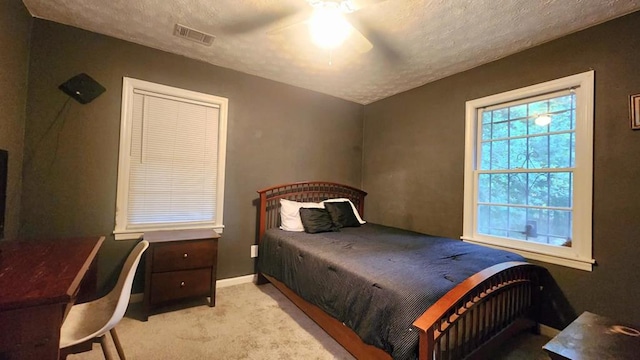 1434 John Smith Ave, Columbus, GA 31903 - bedroom featuring carpet, a textured ceiling, and ceiling fan