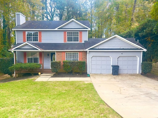 6840 Hidden Lake Dr, Rex, GA 30273 - traditional home with a chimney, a front lawn, driveway, a garage, and a porch