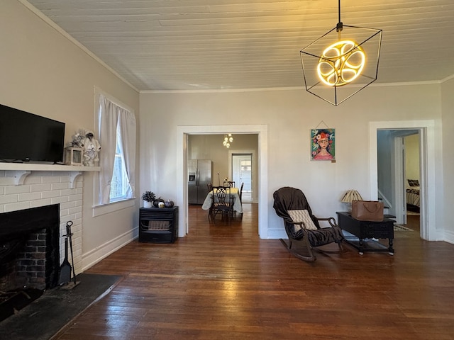 interior space with dark hardwood / wood-style floors, crown molding, a chandelier, a fireplace, and wood ceiling