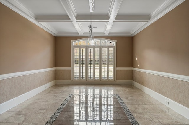 unfurnished room with coffered ceiling, ornamental molding, and beam ceiling