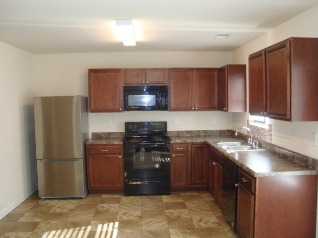 kitchen featuring black appliances and sink