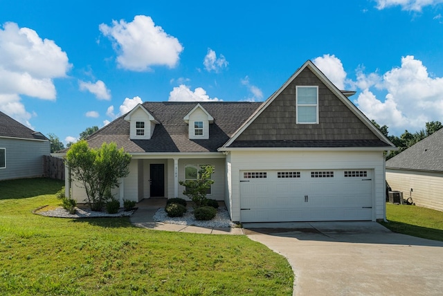 3102 Gatewood Dr, Phenix City, AL 36870 - view of front of home featuring concrete driveway, a front lawn, and a shingled roof