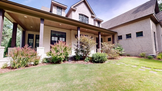 7718 River Crest Dr, Columbus, GA 31904 - entrance to property featuring a porch and a yard