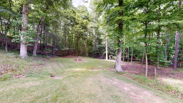 7718 River Crest Dr, Columbus, GA 31904 - view of green lawn featuring a forest view