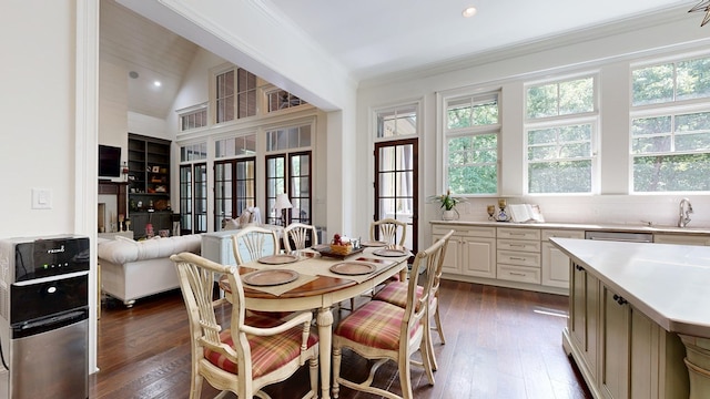7718 River Crest Dr, Columbus, GA 31904 - dining room with dark wood-type flooring, crown molding, and recessed lighting