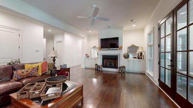 7718 River Crest Dr, Columbus, GA 31904 - living room with ceiling fan, dark wood finished floors, a fireplace with raised hearth, crown molding, and recessed lighting