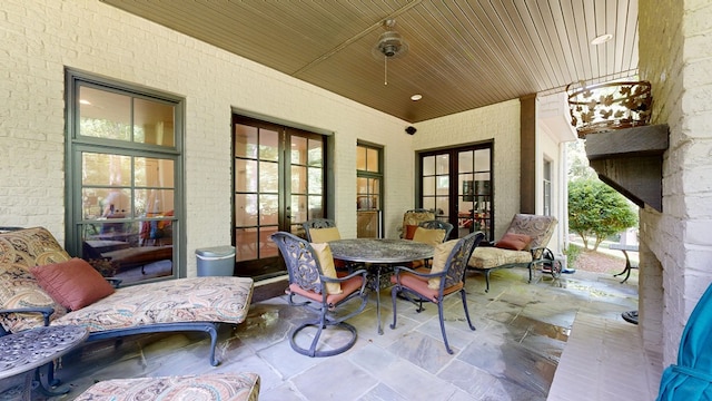 7718 River Crest Dr, Columbus, GA 31904 - view of patio with french doors and outdoor dining area