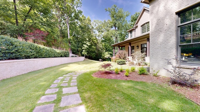 7718 River Crest Dr, Columbus, GA 31904 - view of grassy yard featuring a porch