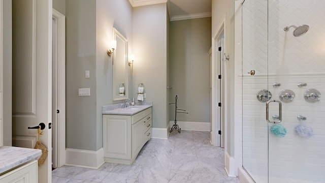 7718 River Crest Dr, Columbus, GA 31904 - bathroom featuring vanity, a stall shower, ornamental molding, marble look tile flooring, and baseboards