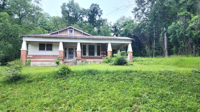 1221 16th Ave, Phenix City, AL 36867 - craftsman-style home with a porch and brick siding