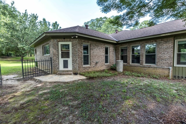 175 Slaughter Dr, Waverly Hall, GA 31831 - view of front of home featuring brick siding and a shingled roof