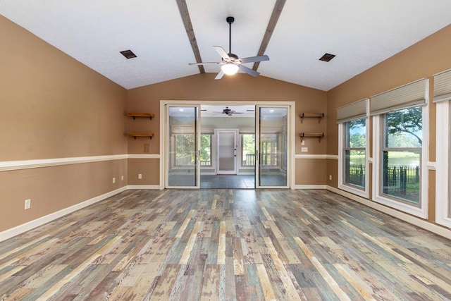 175 Slaughter Dr, Waverly Hall, GA 31831 - unfurnished living room with wood finished floors, ceiling fan, healthy amount of natural light, and lofted ceiling